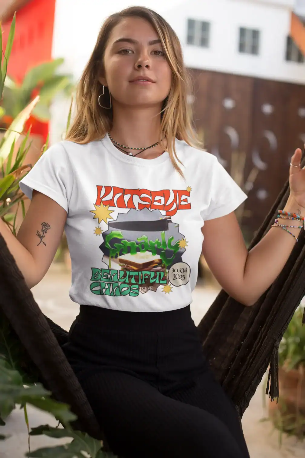 model wearing white katseye beautiful chaos t-shirt authentic