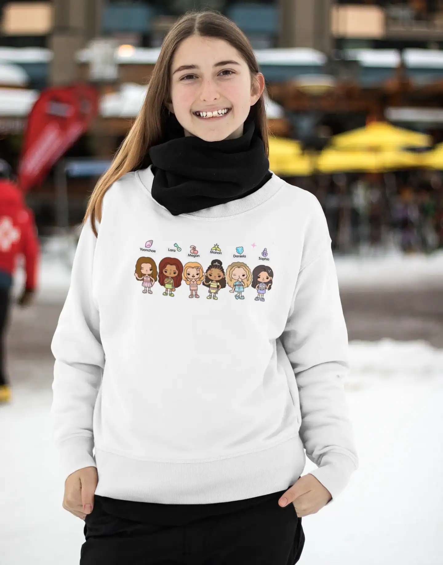 similing model wearing white katseye Sweatshirt with cute band members design