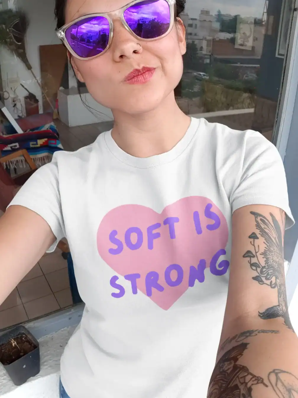 tatooed girl weating white katseye soft is strong t-shirt