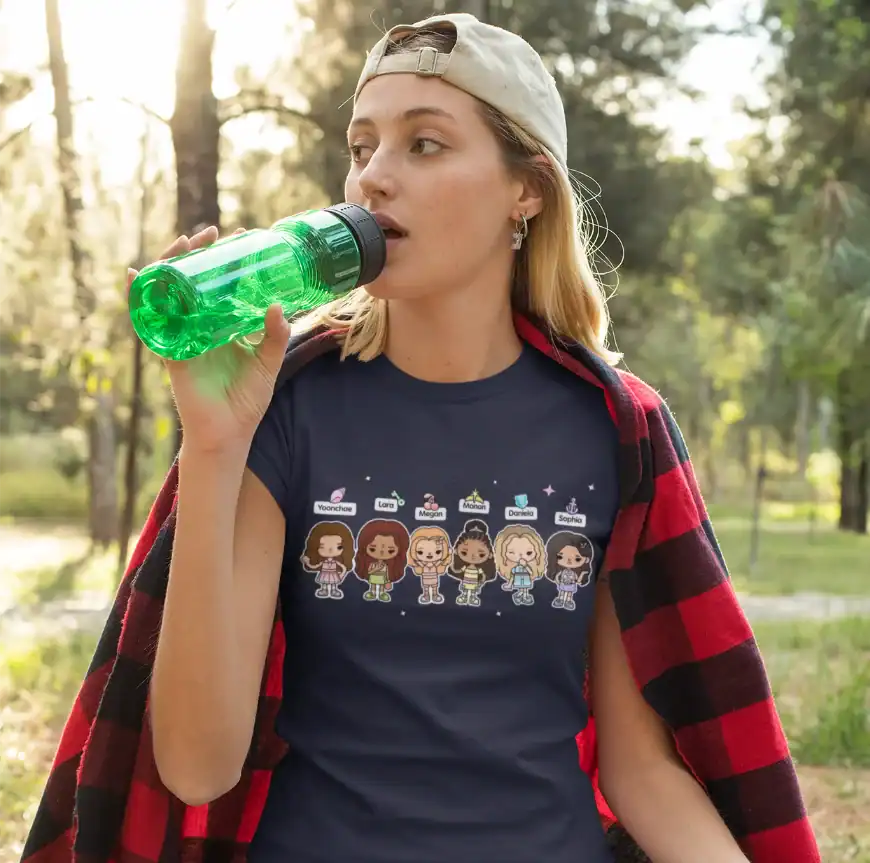 girl drinking water while wearing blue katseye x toca boca t-shirt, unisex made of 100% cotton